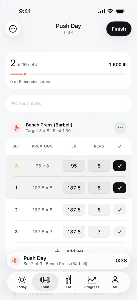 Push Day in progress: the bench press with last time's sets, 187.5 lb × 8, already filled in, the warm-up and first set checked off, 2 of 16 sets done.
